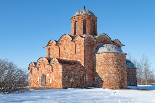 Ancient Orthodox Church of the Transfiguration of the Savior on Kovalevo on a sunny March day. Neighborhood of Veliky Novgorod, Russia