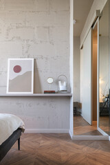 wall in the loft bedroom, bedroom in loft style, bedroom in gray and beige tones