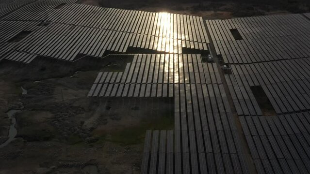 Aerial view of Solar panel, photovoltaic, alternative electricity source - concept of sustainable resources on a sunny day, Song Bieu lake, Ninh Thuan, Vietnam