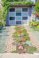 Fototapeta na wymiar Driveway with succulents and grass in between at San Francisco, California