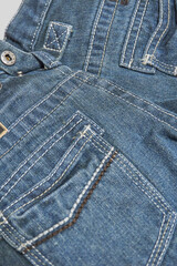 Close-up jeans, clothing details, back pockets, soft selective selective focus