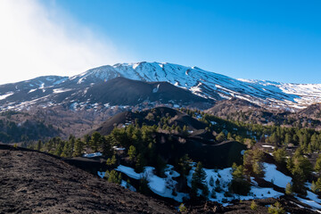 Panoramic view on solidified lava, ash, pumice fields of erupted Sartorio crater. Landscape dark...