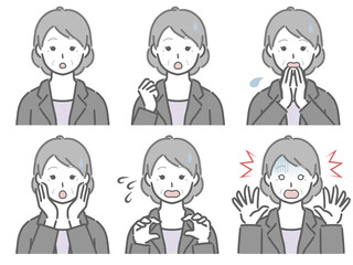 驚く表情の強弱　スーツの高齢女性