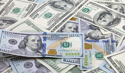 Background of 100 new and old dollar bills