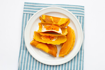 Thai crispy pancakes on white background.