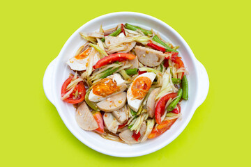 Spicy papaya salad with salted egg and vietnamese pork sausage