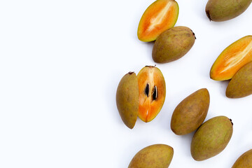 Fresh sapodilla fruit on white background