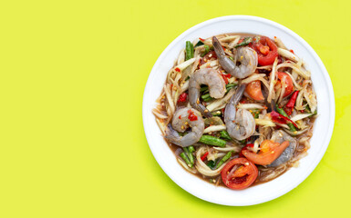 Papaya salad with shrimp in white plate