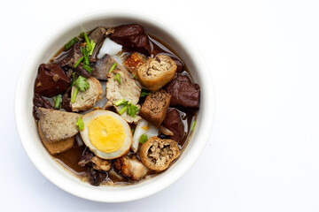 Boiled Chinese pasta square with pork soup