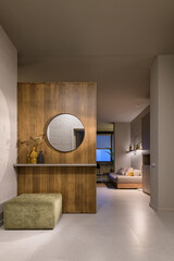 Living room in loft style, apartment with open plan loft style, evening lighting in the living room, corridor