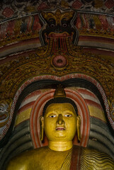 Fototapeta premium Buddha statue at Dambulla rock temple, Sri Lanka