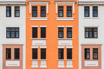 Many windows in a row on the facade of the modern urban apartment building front view, Krasnaya...