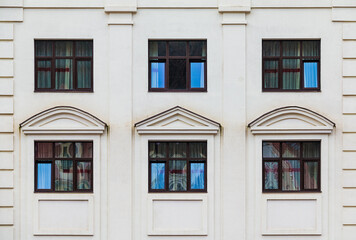 Several windows in a row on the facade of the modern urban apartment building front view, Krasnaya Polyana, Sochi, Krasnodar Krai, Russia
