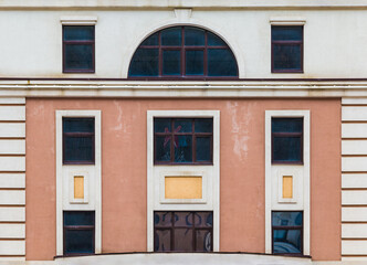 Many windows in a row on the facade of the modern urban apartment building front view, Krasnaya Polyana, Sochi, Krasnodar Krai, Russia
