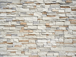 Facade decoration with decorative natural stone. Texture of decorative stone