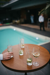 Happy smiling businessman with glass of champagne.