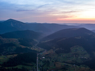 Fototapeta premium Ukrainian Carpathians mountains on a summer morning. Aerial drone view.