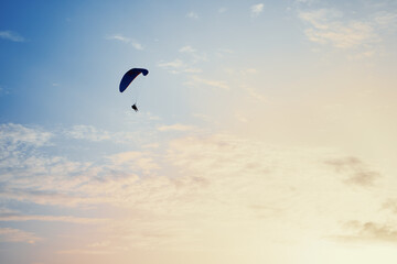 Paraplane on the blue sky background, leisure activity.