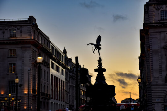 Anteros statue, known as Eros statue. Shaftesbury Memorial Fountain, Piccadilly Circus with sunset 