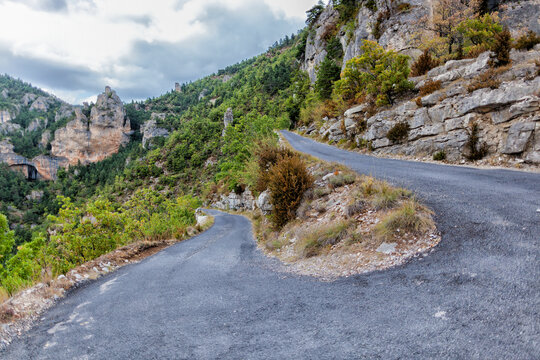 One of a series of sharp bends in the road coming down a steep cliff in the Tarn Gorge.
