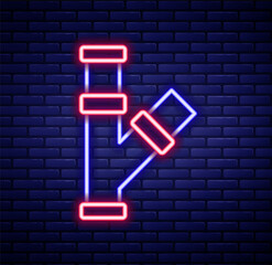 Glowing neon line Industry metallic pipe icon isolated on brick wall background. Plumbing pipeline parts of different shapes. Colorful outline concept. Vector