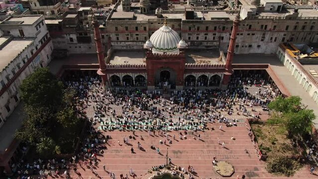 An aerial shot of Jama Masjid with people praying namaz in New Delhi,India