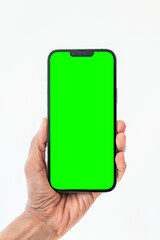 Close up hand hold phone isolated on white, smartphone green color blank screen