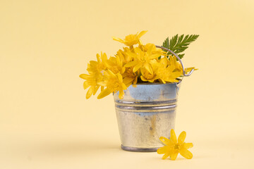 Bouquet of yellow flowers on a yellow background. greeting card