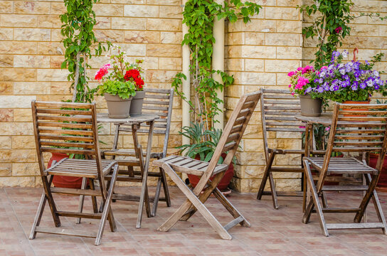Chairs in the garden restaurant in Leptokarya, Greece.