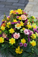 Pink and yellow spring bouquet with daffodils, gerberas, carnations, chrysanthemums. Celebration concept