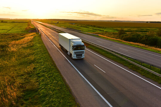 Truck DAF FX with Semi-trailer driving along highway. Goods Delivery by roads. Services and Transport logistics. Russia, Smolensk, Aug 25, 2021.