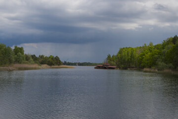 Broken house sunken into Pripyat river in the Ukraine