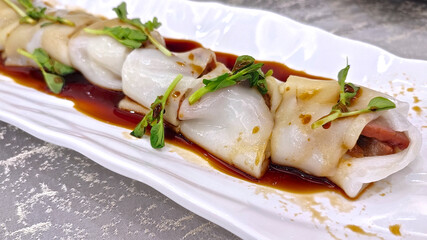 Chinese Steamed Rice Noodle Rolls With barbecue pock - Asian food style