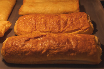 Baking meat pie in an oven, close up