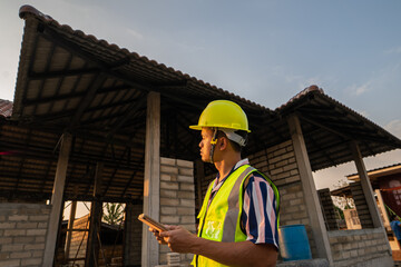 Civil engineering working in new house construction  site building