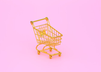 Golden shopping cart on pink background. 3d rendering, 3d illustration