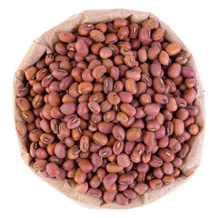 red mung bean in a paper bag on a white background