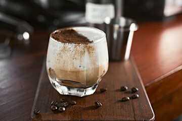 Iced coffee vanilla latte with milk foam. - obrazy, fototapety, plakaty