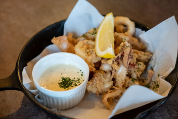 Close up of Fried Squid served on plate.