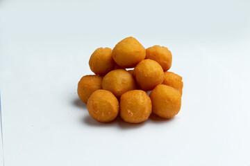 Fried cheese balls. On a white background.