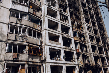 Mariupol, Ukraine - May 1, 2022: Russia's war in Ukraine. Damaged residential building