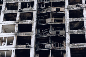 Mariupol, Ukraine - May 1, 2022: Russia's war in Ukraine. Damaged residential building