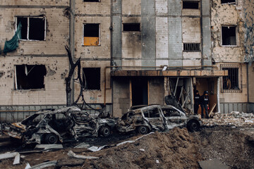 Mariupol, Ukraine - May 1, 2022: Russia's war in Ukraine. Damaged residential building