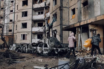 Deurstickers Mariupol, Ukraine - May 1, 2022: Russia's war in Ukraine. Damaged residential building © Yevheniia