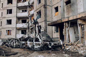 Mariupol, Ukraine - May 1, 2022: Russia's war in Ukraine. Damaged residential building