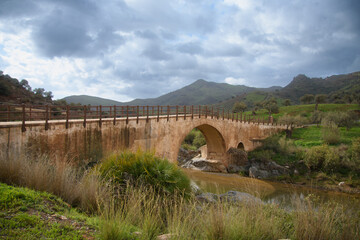 View of a very beautiful valley whit a nice bridge in Andalusia near Almogia, Spain