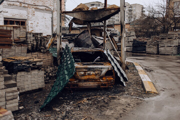 Irpin, Kyiv region, Ukraine - May 21, 2022: War in Ukraine. Cemetery of shot cars in Irpin