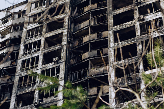 Mariupol, Ukraine - May 1, 2022: Russia's war in Ukraine. Damaged residential building