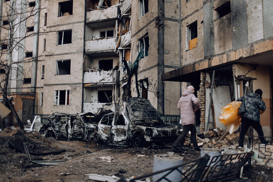 Mariupol, Ukraine - May 1, 2022: Russia's war in Ukraine. Damaged residential building - Powered by Adobe