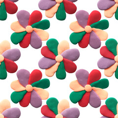Seamless pattern photo flowers made of air plasticine multicolored on a white background